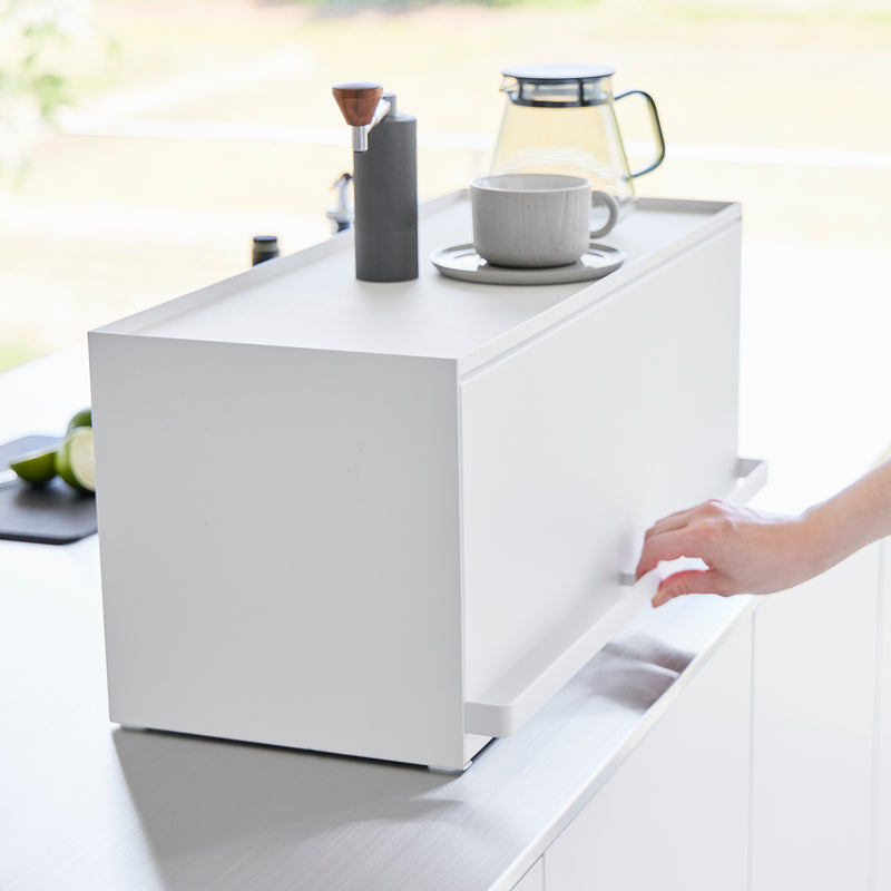 Side view of white Yamazaki Home Front-Opening Kitchen Countertop Storage Rack closed