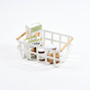Yamazaki Home Storage Basket - Two Sizes with props, set against a white background.