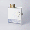GIF of Concealable Spice Rack - Steel in White, styled with kitchen props to show the door opening and closing against a white background.