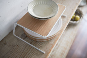 Aerial view of Dish Riser displaying plates on kitchen shelf by Yamazaki Home. view 5