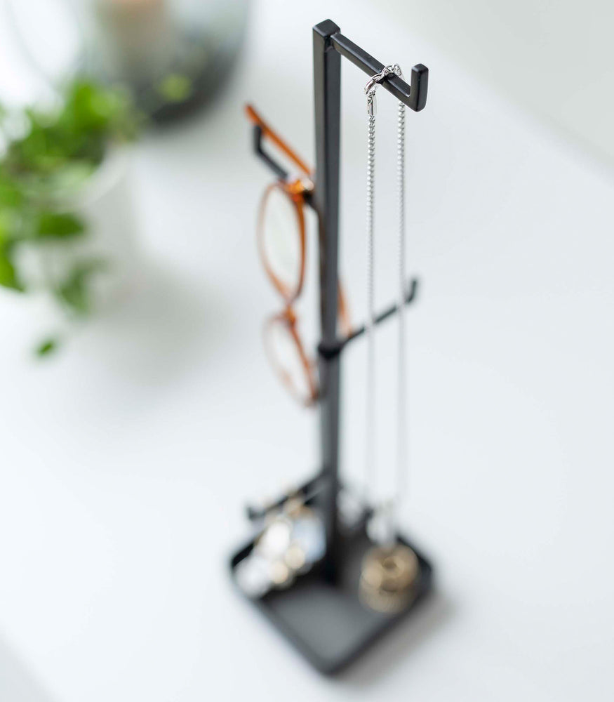 View 13 - Black Yamazaki Home Tree Accessory Stand displaying a necklace