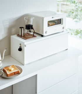 White Yamazaki Home Bread Box - Wide with a toaster and coffee equipment on top view 2