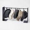 Yamazaki Home Hat Hanging Organizer with props, set against a white background.
