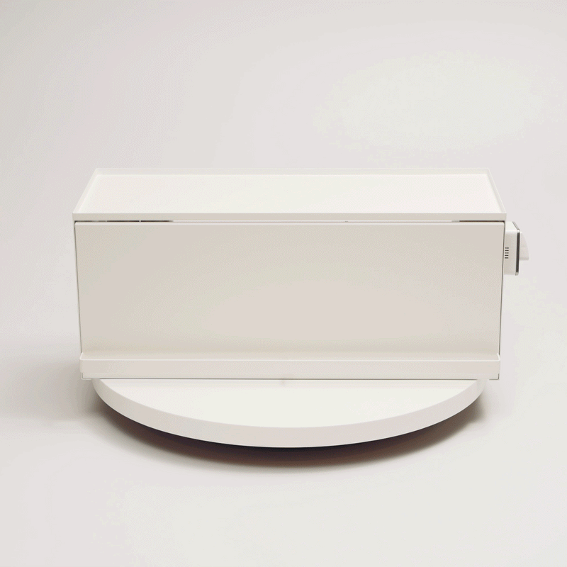 Gif of Open-Back Countertop Storage Rack in white by Yamazaki Home showing the storage is opened and closed in sequence with a white background.