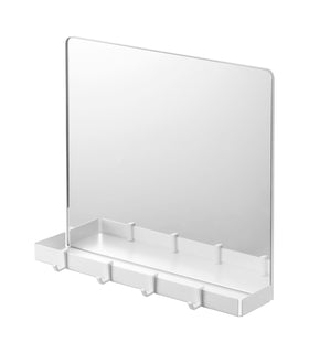 Magnetic Mirror with Storage Rack on a blank background. view 1