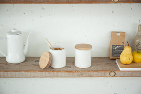 Front view of Ceramic Food Canister on kitchen shelf by Yamazaki Home. view 3