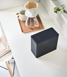 Black Yamazaki Home kitchen storage box with a closed lid on countertop view 11