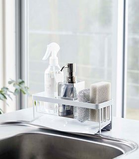 White steel sponge and soap bottle holder with white draining tray. view 3