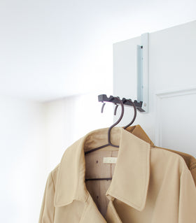 Over-the-Door Hook displaying jackets on door by Yamazaki Home. view 9