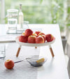 White Yamazaki Countertop Pedestal Tray with apples on top