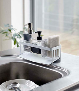 White steel sponge and soap bottle holder with white draining tray. view 5