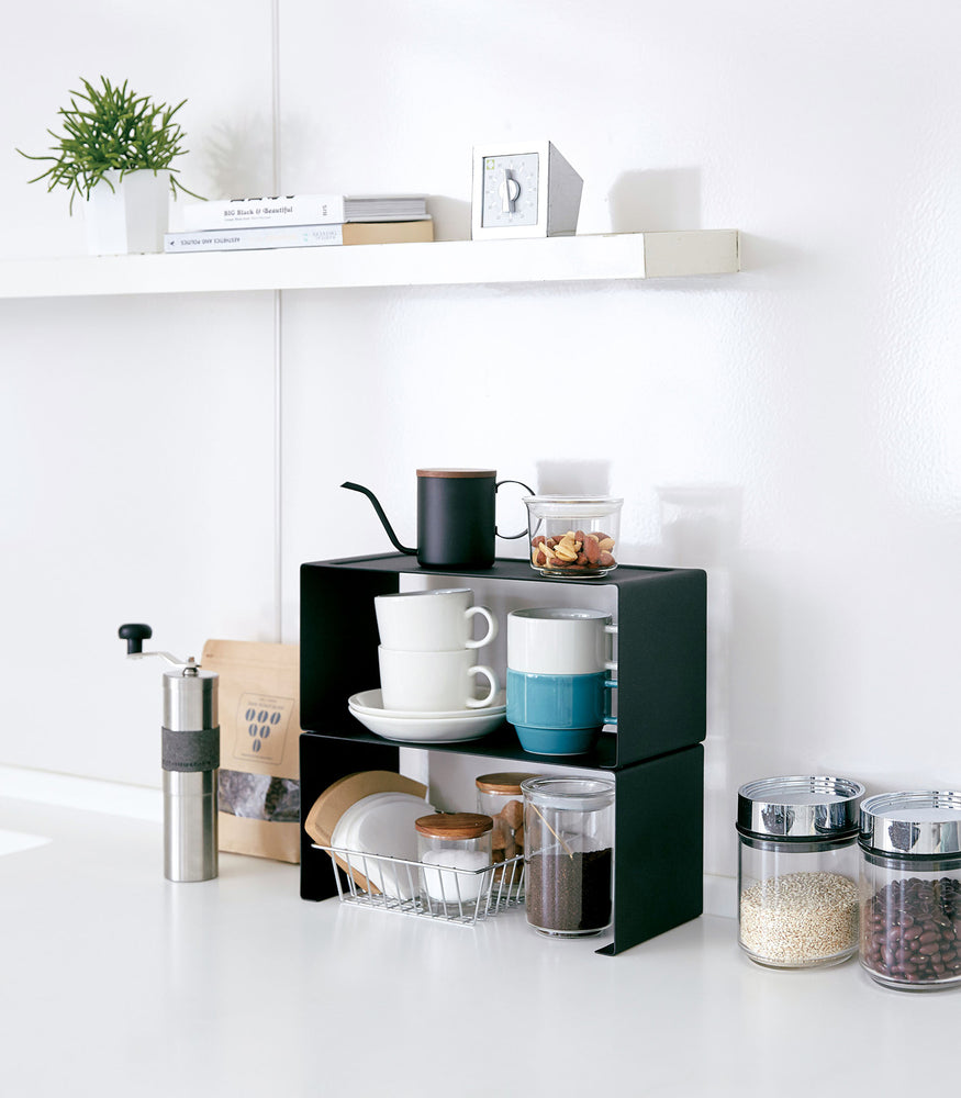 View 10 - Black Stackable Countertop Shelves stacked together holding coffee equipment by Yamazaki Home.