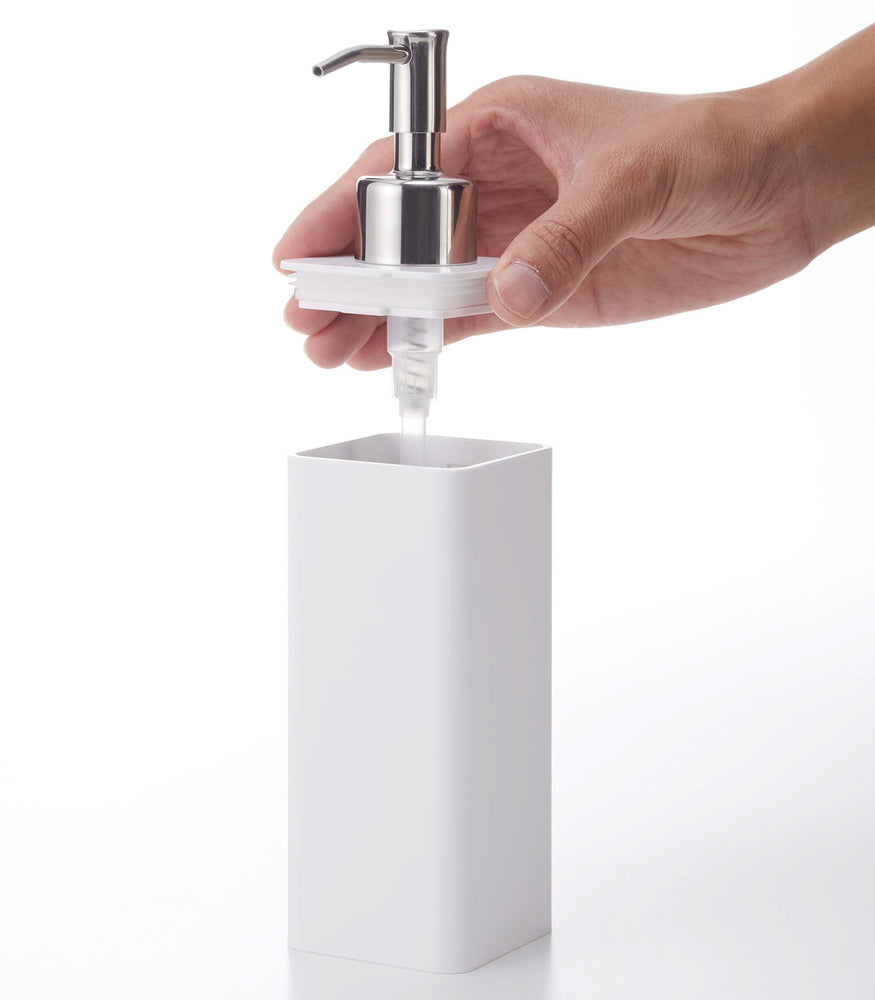 View 6 - Removing lid from white Yamazaki Home square soap dispenser