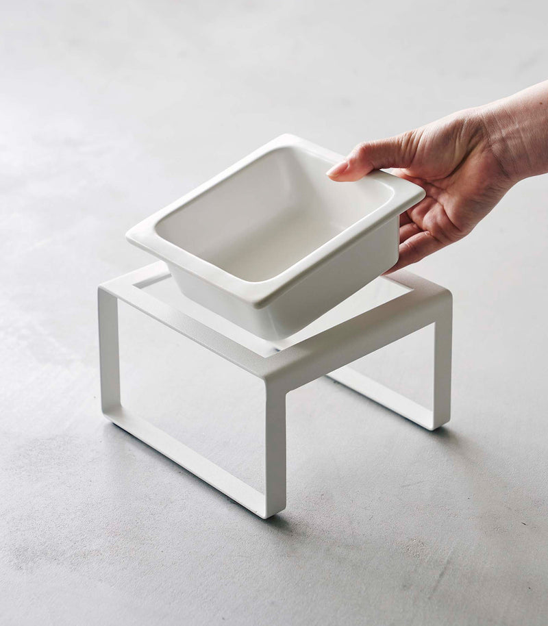 Removing bowl of white tall Yamazaki Single Pet Food Bowl