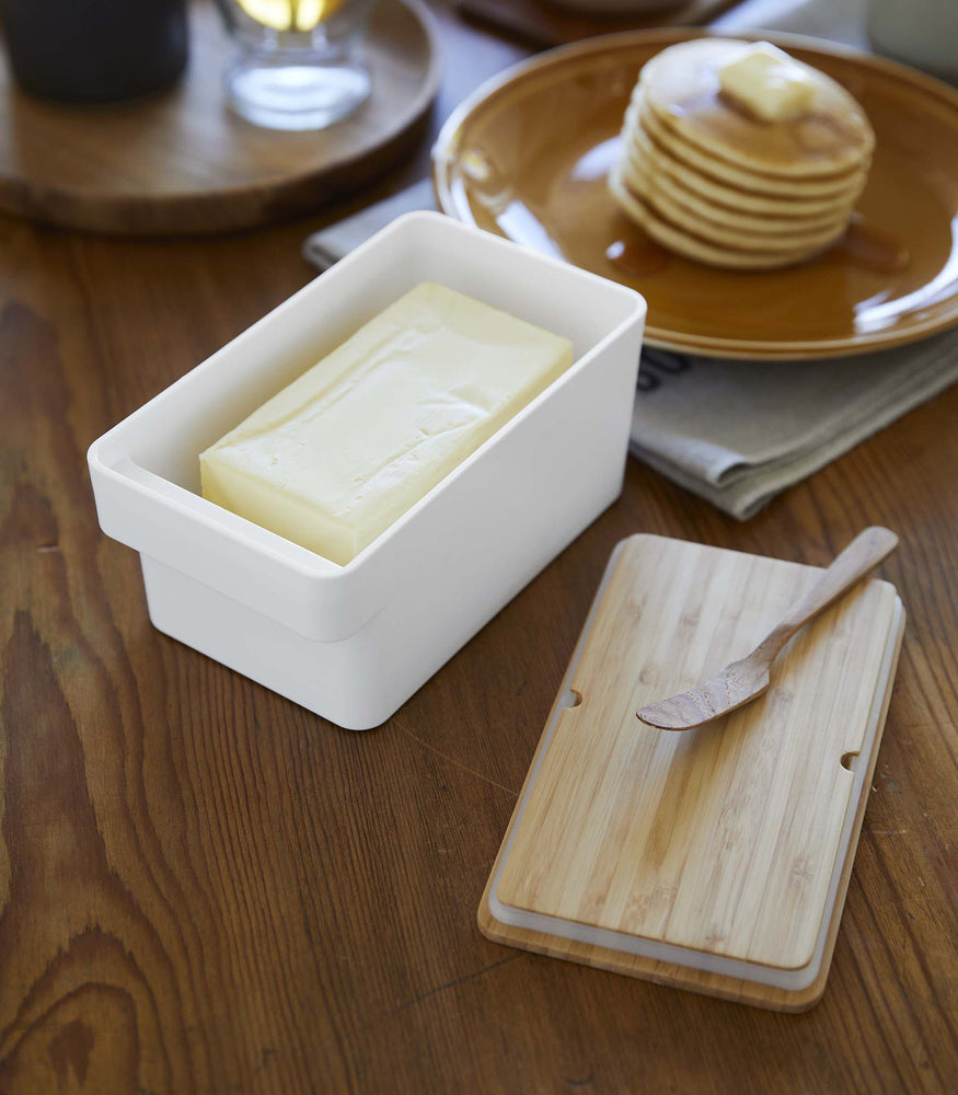 View 3 - Yamazaki Butter Case opened on a dining table with butter inside