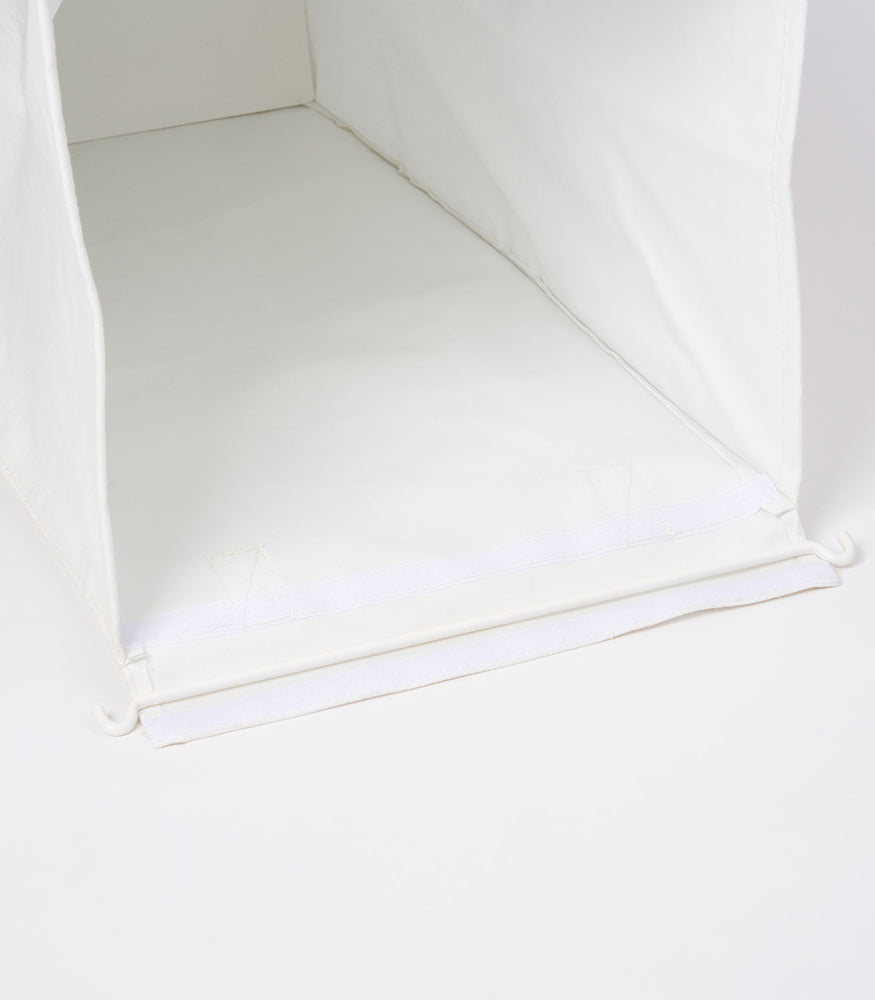 View 21 - Image showing the velcro fixture on the small Laundry Hamper with Cotton Liner by Yamazaki Home in white on a white background.