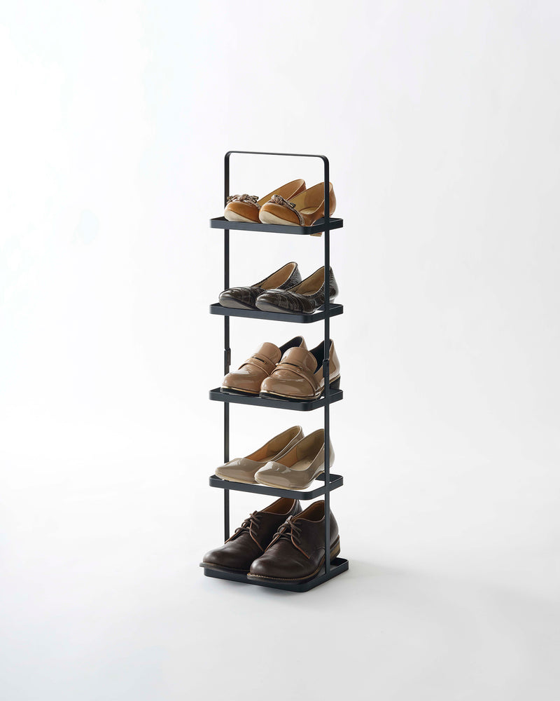 View 19 - Prop photo showing Shoe Rack with various props.