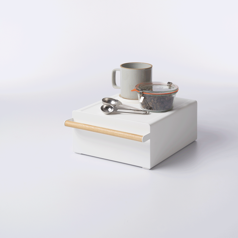 GIF of Countertop Rack with Drawer organizing kitchen items against a white background.