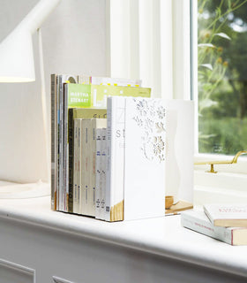 White Bookends displaying books on windowsill by Yamazaki Home. view 6