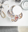 White Magnetic Organizer holding kitchen and cleaning equipment by Yamazaki home.