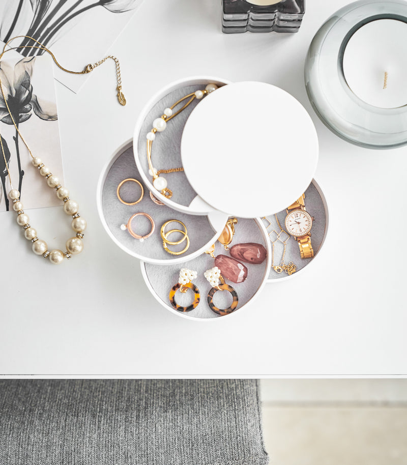 White Magnetic Organizer holding kitchen and cleaning equipment by Yamazaki home.