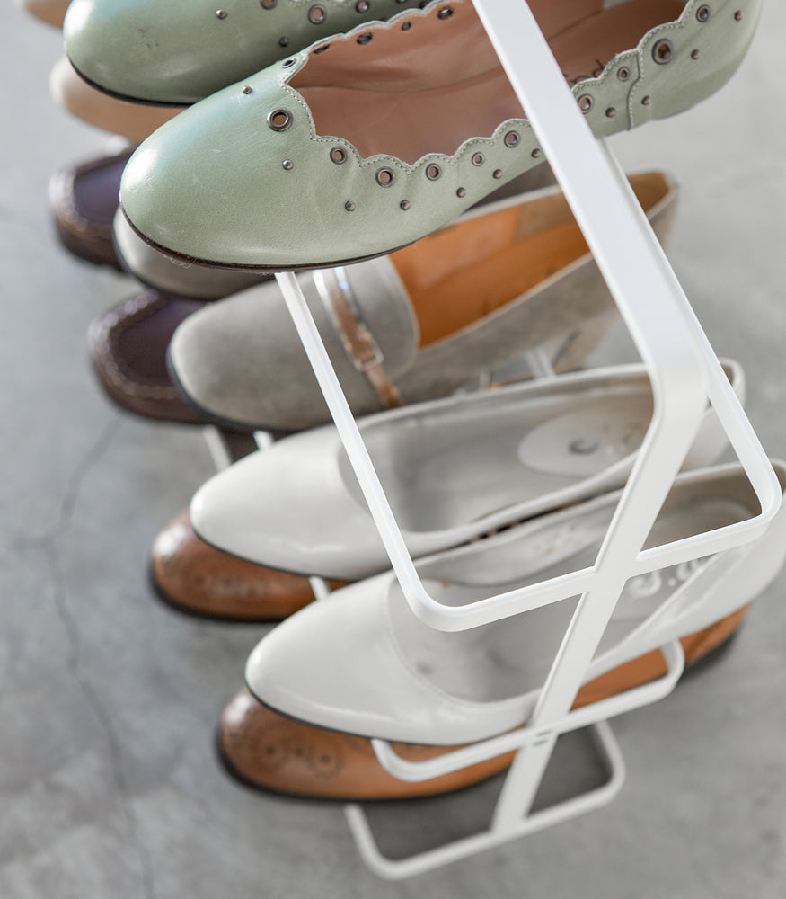 View 3 - Close up of white Shoe Rack holding shoes by Yamazaki home.