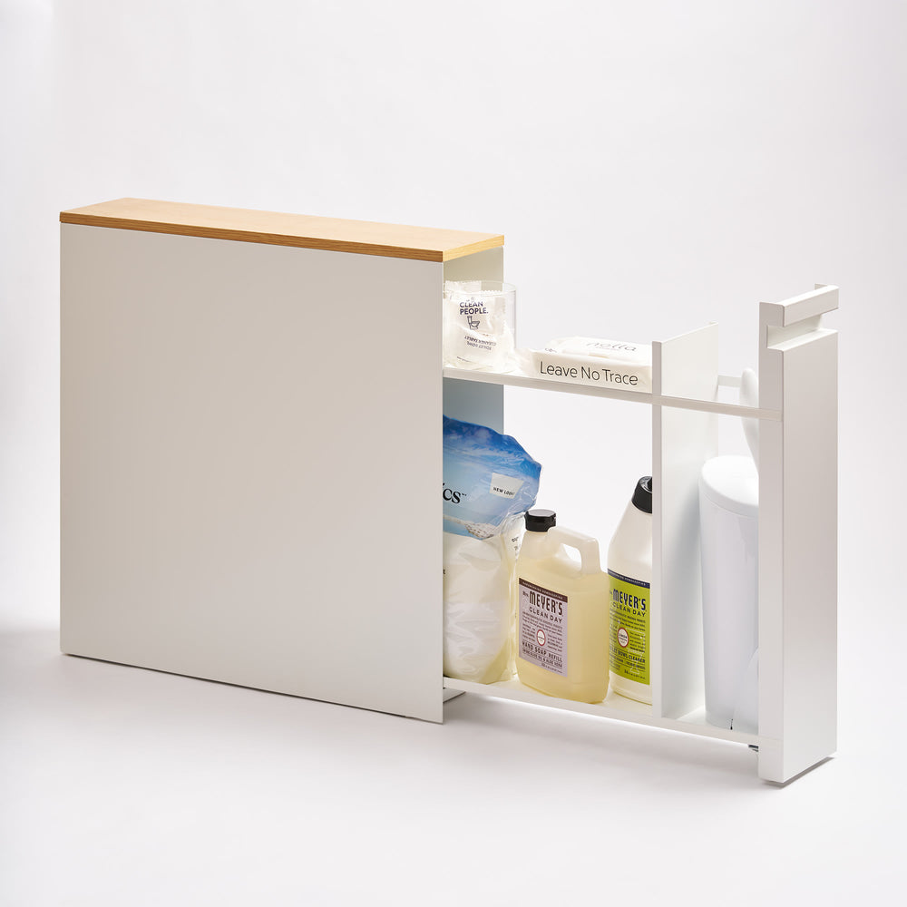 Pull-Out Bathroom Storage Cabinet - Steel + Wood in White by Yamazaki Home, storing bathroom items with a white background.