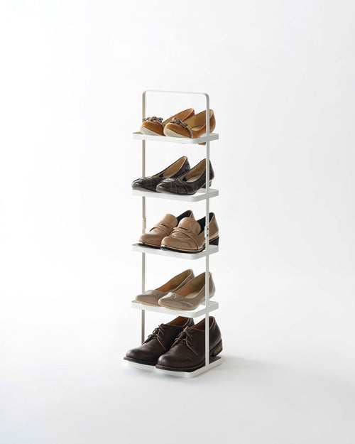 White Yamazaki shoe rack filled with shoe