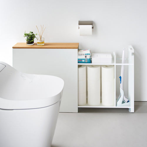 Side view of white Yamazaki Home Pull-Out Bathroom Storage Cabinet fully open containing bathroom products