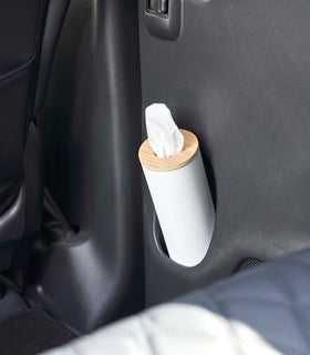 Small white Yamazaki Home Round Tissue Case in a car door cup holder view 6