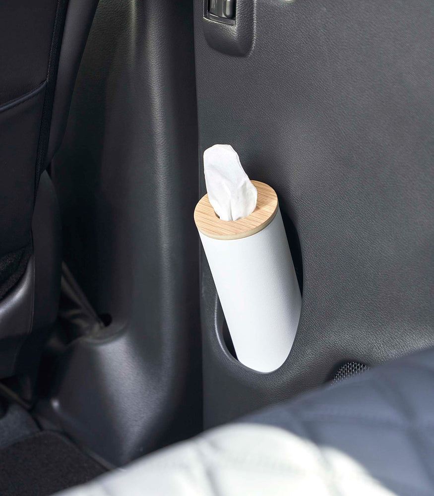 View 6 - Small white Yamazaki Home Round Tissue Case in a car door cup holder