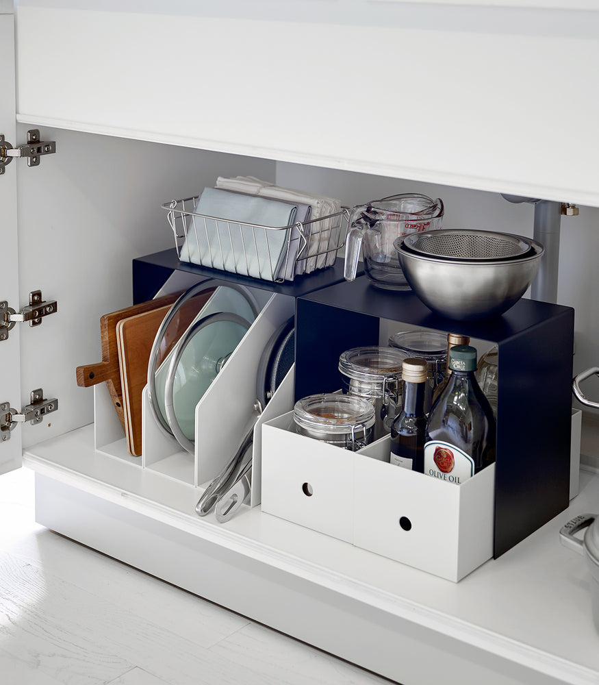 View 8 - Yamazaki Black Under-Cabinet Storage Shelves holding kitchen essentials.