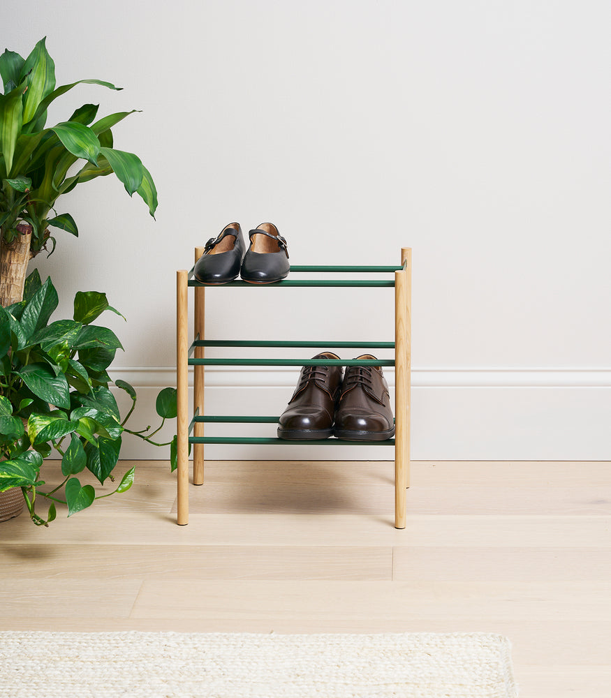 View 3 - Forest Green Yamazaki Home Expandable Shoe Rack with 2 pairs of shoes fully collapsed