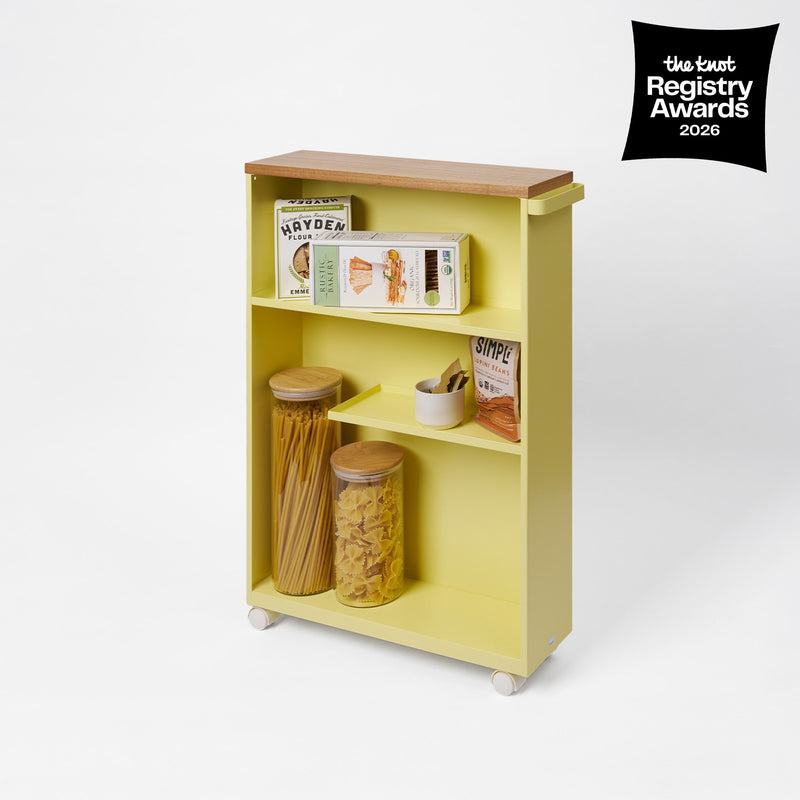 Rolling Storage Cart (27" H) - Steel in Yellow with props on the white background, having the knot awards logo on the upper right.
