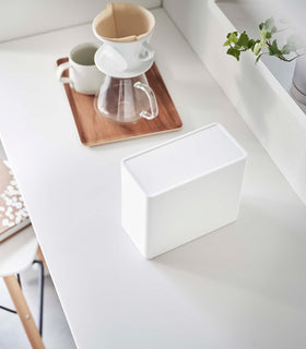 White Yamazaki Home kitchen storage box with a closed lid on countertop view 3