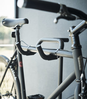 Close up of storage rungs on Yamazaki Home Bicycle Stand view 4