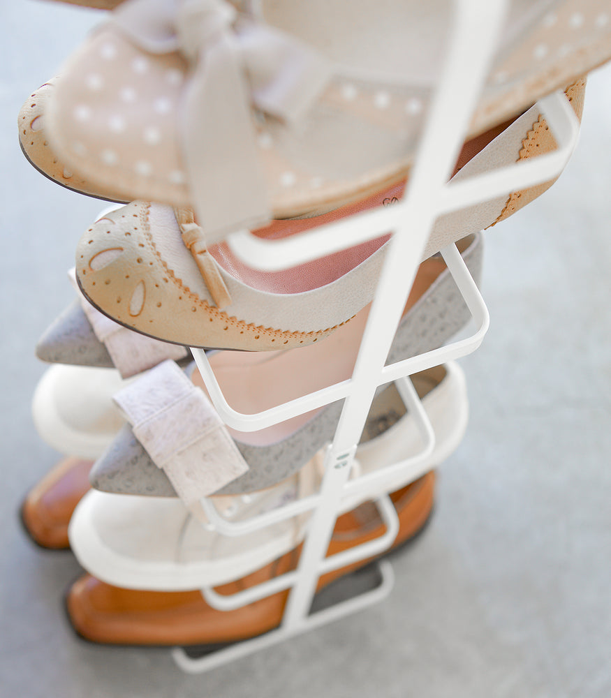 View 17 - White Shoe Rack holding dress shoes by Yamazaki home.