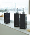 Black Yamazaki Home square soap dispenser in three styles by bathtub