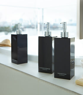 Black Yamazaki Home square soap dispenser in three styles by bathtub view 7