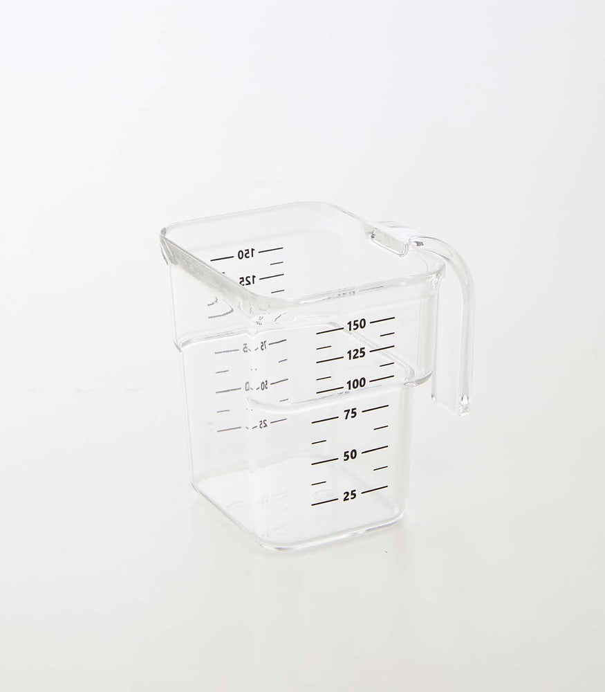 View 45 - Clear measuring cup on white background by Yamazaki Home.