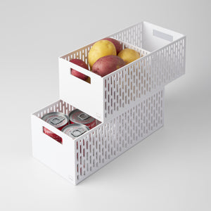 Yamazaki Home Stackable Vegetable Stocker with props, set against a white background.