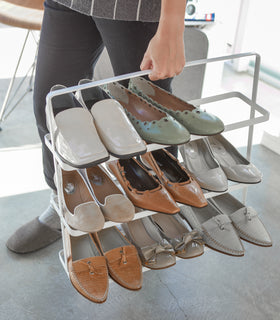 Front view of white Shoe Rack holding shoesby Yamazaki home. view 5