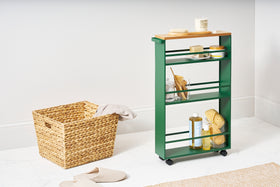 Forest Green Yamazaki Home Slim Storage Cart storing bathroom accessories in a bathroom view 4