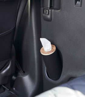 Small black Yamazaki Home Round Tissue Case in a car door cup holder view 14