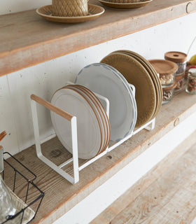 Wood-Accented Dish Storage Rack displaying plates on shelf by Yamazaki Home. view 5