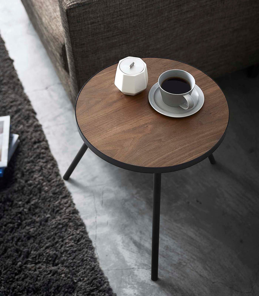 View 12 - View of Black Side Table by Yamazaki Home from the top, with a cup of coffee and sugar canister.