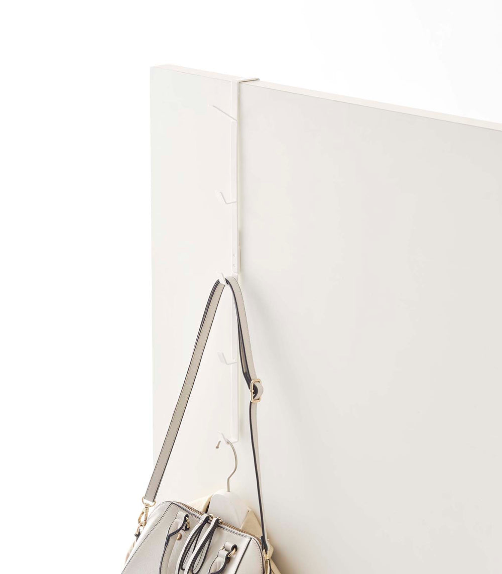 Prop photo showing Over-the-Door Vertical Hooks with various props.