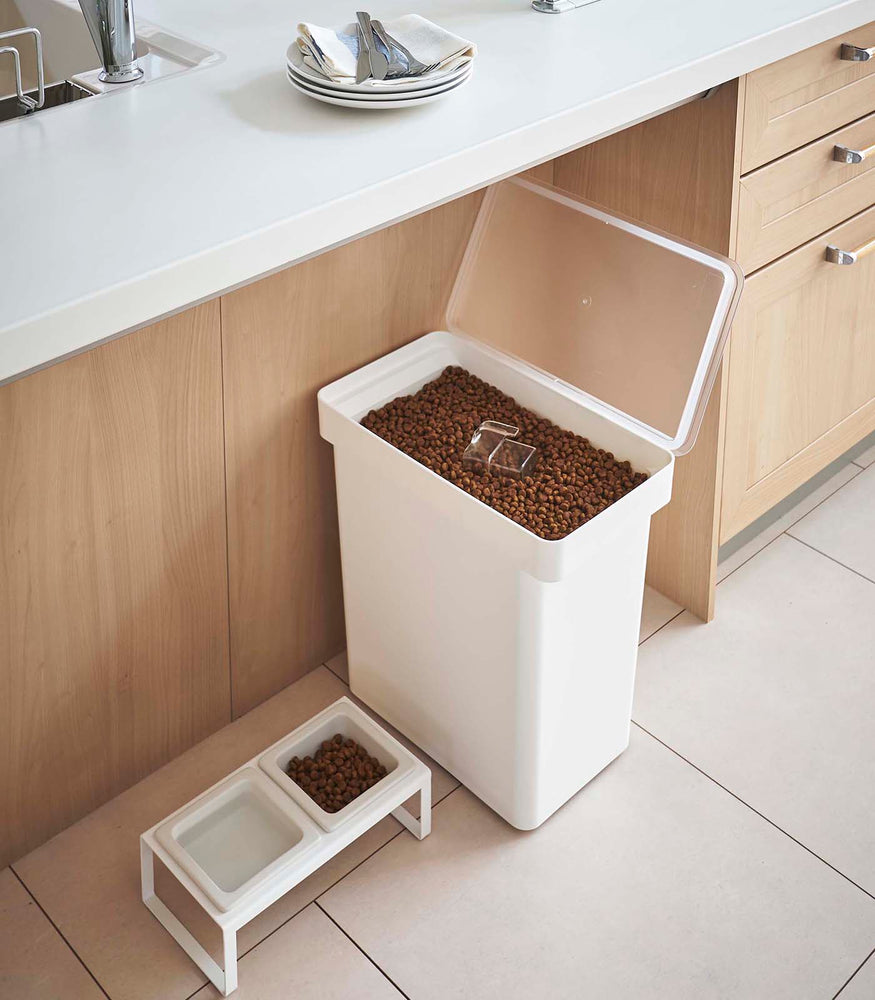 View 3 - Aerial view of white Airtight Food Storage Container open and holding pet food by Yamazaki Home.