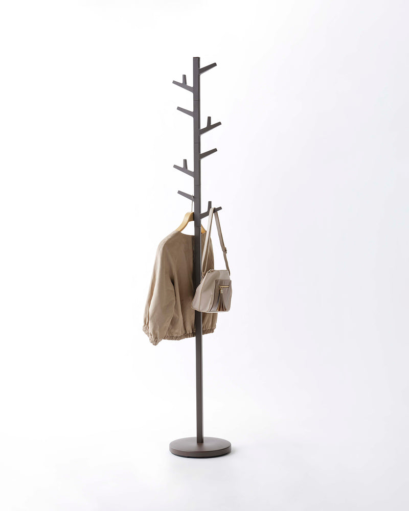 View 7 - Prop photo showing Coat Rack with various props.