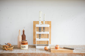 Front view of white Knife & Cutting Board holding knives and cutting board on shelf by Yamazaki Home. view 4